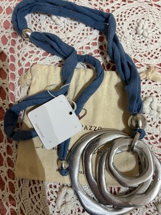 Collana Vestopazzo con ciondolo cerchi argentato