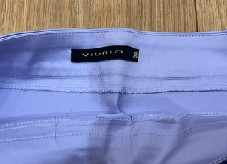 Minifalda lila pastel violeta plisada con cinturón