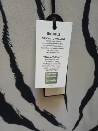 Blusa elegante beige e nera