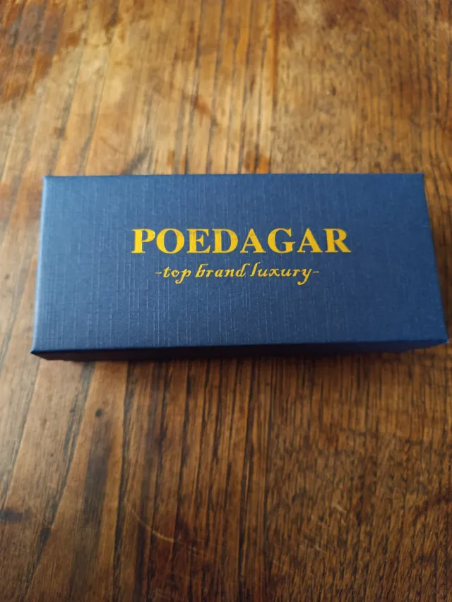 Reloj POEDAGAR Rojo y Plateado