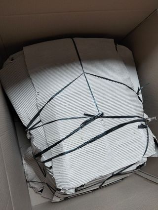 Poltrona in rattan e metallo nero