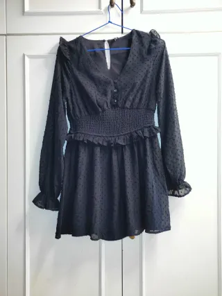 Mono negro corto con lunares negros