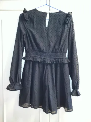 Mono negro corto con lunares negros