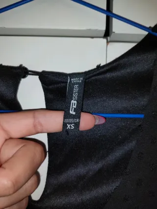 Mono negro corto con lunares negros