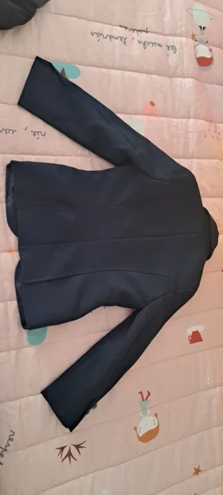 Chaqueta de equitación azul marino para concurso.