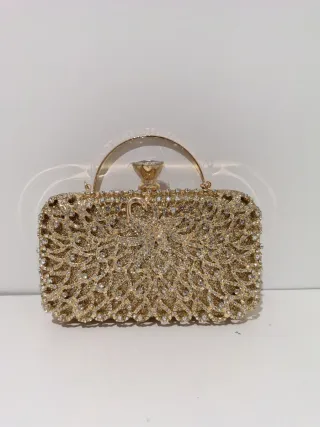 Bolso de fiesta dorado con pedrería