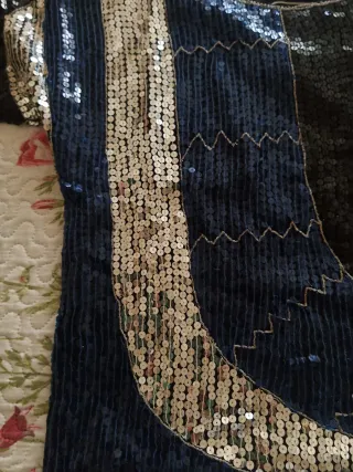 Blusa lentejuelas negra y plateada