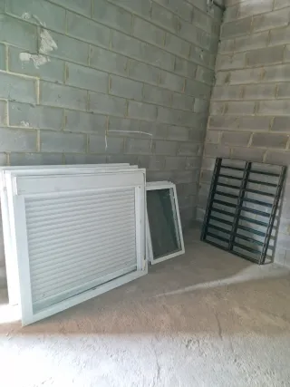 Ventana aluminio y rejas hierro