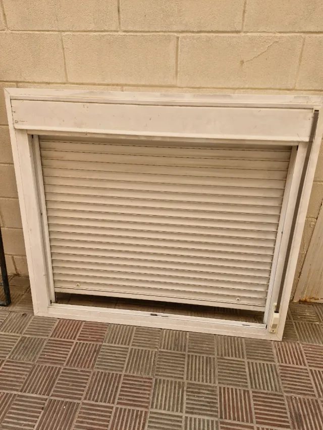 Ventana aluminio y rejas hierro