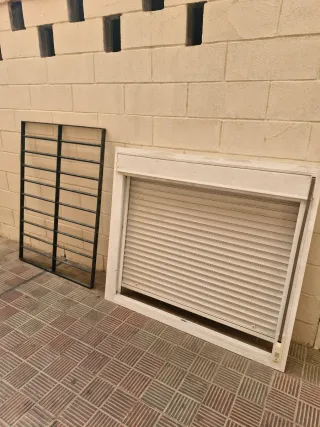 Ventana aluminio y rejas hierro