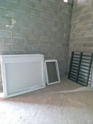 Ventana aluminio y rejas hierro