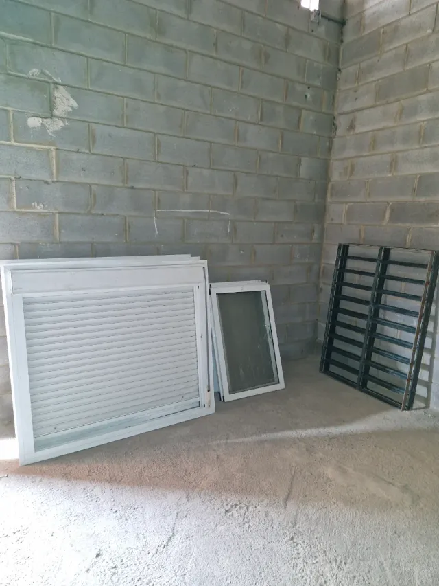 Ventana aluminio y rejas hierro