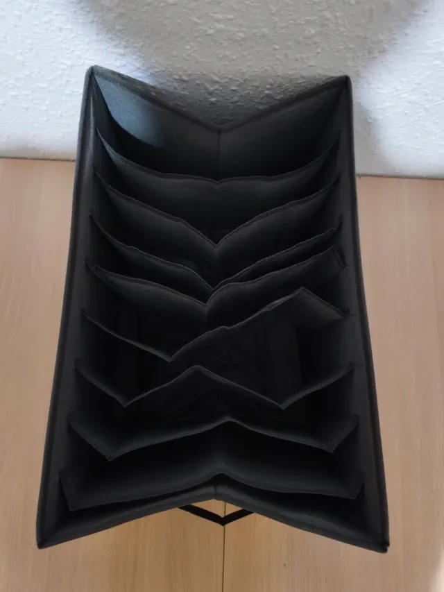 Organizador de tela gris con asas