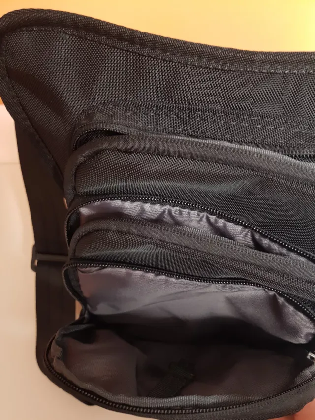 Riñonera negra con pernera