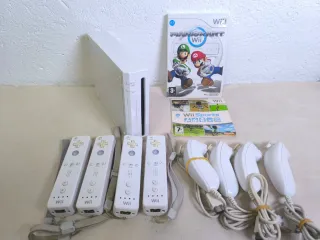 Nintendo Wii + Mario Kart + Wii Sports
