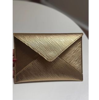 Pochette Louis Vuitton dorada