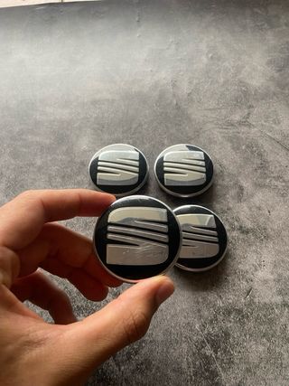 Tapabujes Seat 56mm Negro Plata (4 uds)