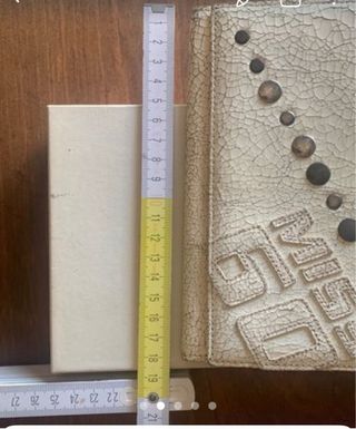 Borsetta rossa con tracolla e portafoglio