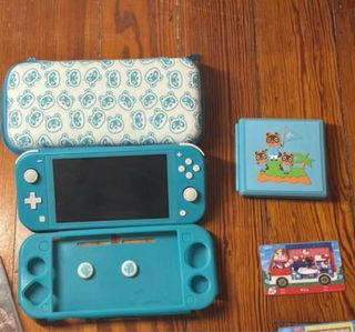 Switch Lite Blu + Accessori