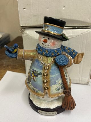 Soprammobile pupazzo neve con uccellino