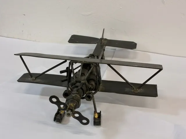 Avión decorativo de metal