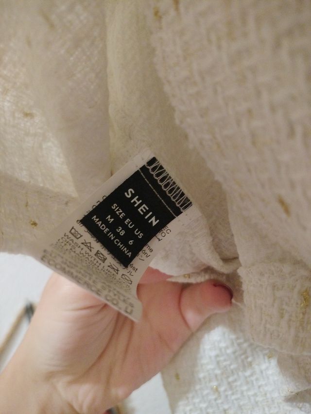 Conjunto chaqueta y vestido blanco elegante