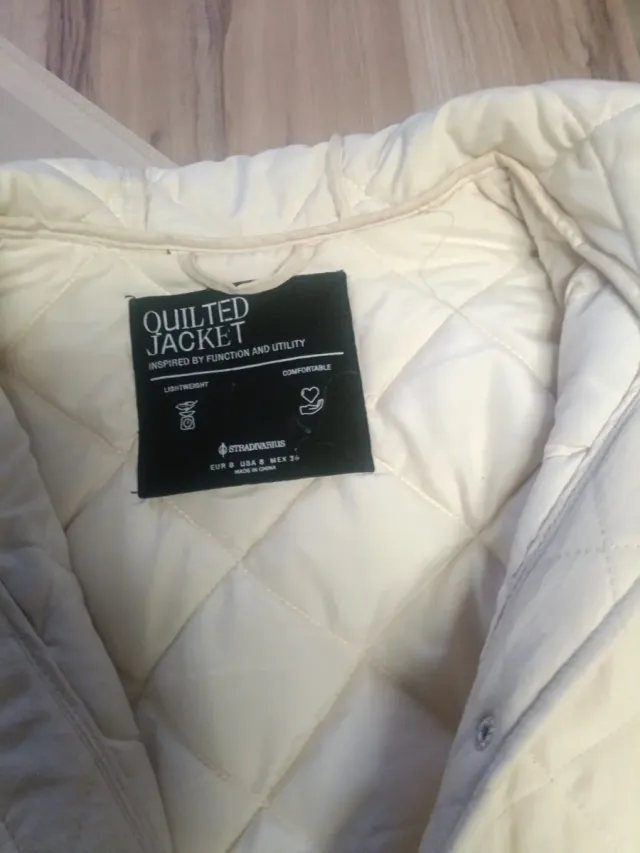 Chaleco largo acolchado mujer beige