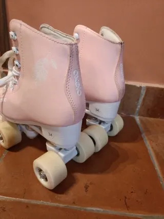 Patines de 4 ruedas rosas Oxelo talla 34.