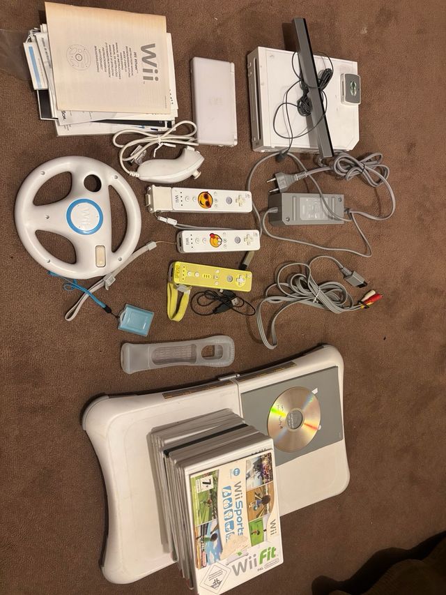Nintendo Wii + Accesorios y Juegos
