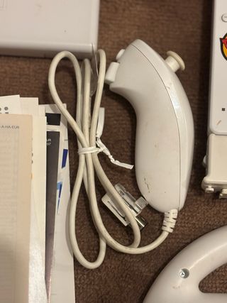 Nintendo Wii + Accesorios y Juegos