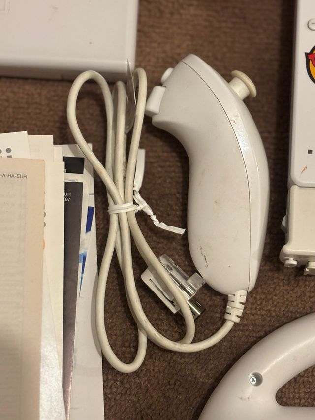 Nintendo Wii + Accesorios y Juegos