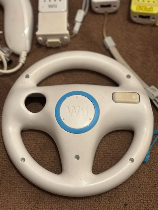 Nintendo Wii + Accesorios y Juegos