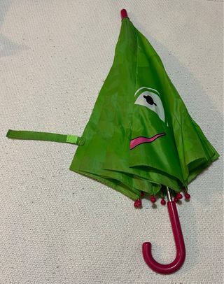 Paraguas infantil verde con cara de rana