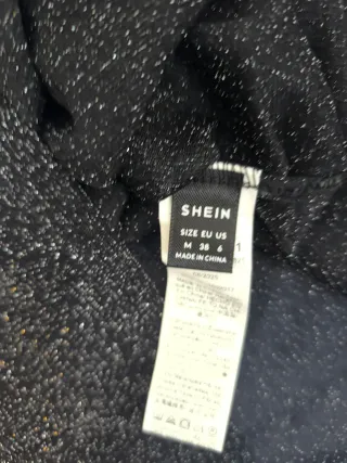 Blusa negra con brillos