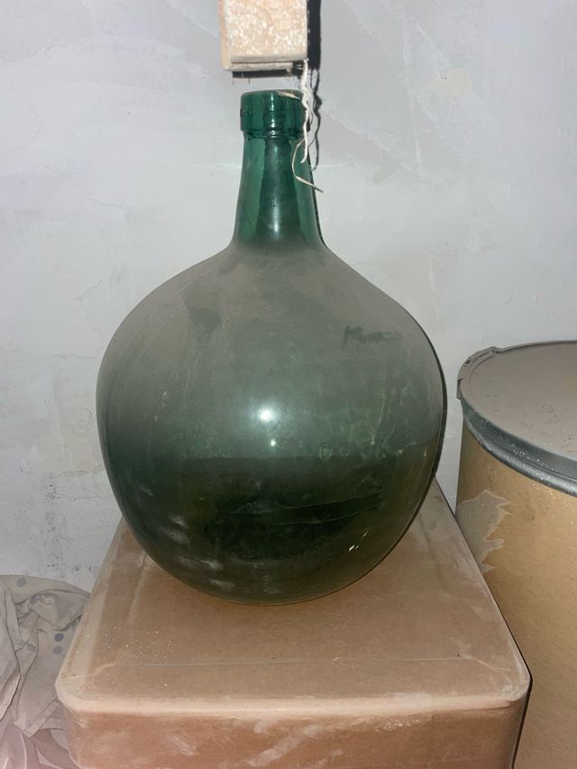 Vecchia Damajuana in vetro verde