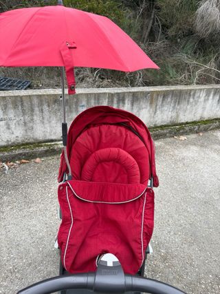 Silla de paseo Stokke roja/granate y capazo