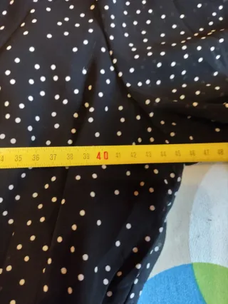 Mono corto negro manga larga lunares