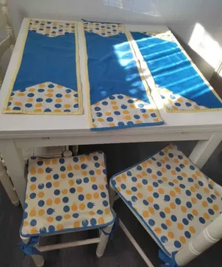 Mantel, fundas cojín y tapetes