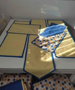 Mantel, fundas cojín y tapetes