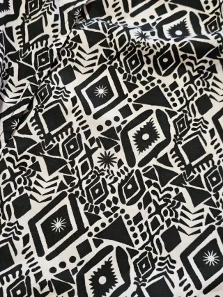 Vestaglia elegante con frange