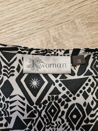 Vestaglia elegante con frange