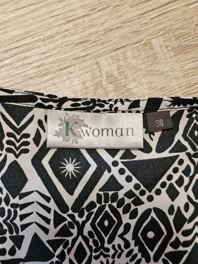 Vestaglia elegante con frange