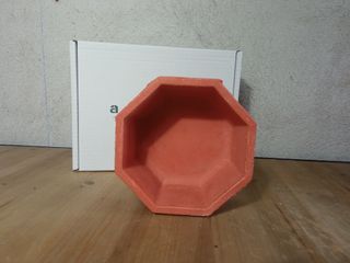 Pezzo ottagonale rustico in cemento rosso