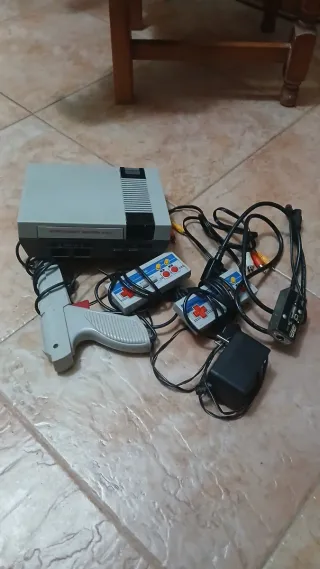 Consola Nintendo NES con accesorios