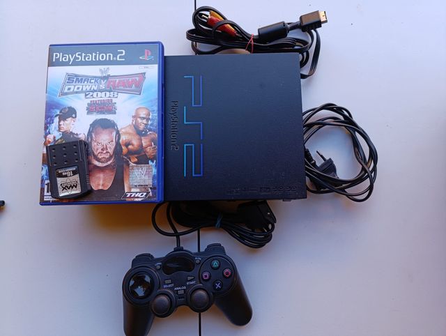 Consola PS2 + Juego Smack Down VS Raw 2008