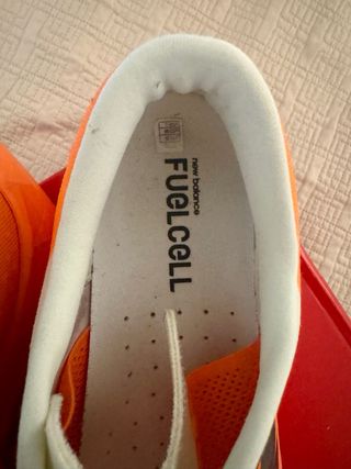 Zapatillas New Balance Rebel V4 Naranja/Blanco