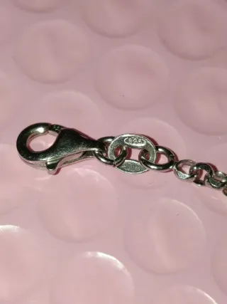 Cadena plata con colgante pluma