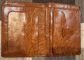 Cartera de piel con diseño de músico