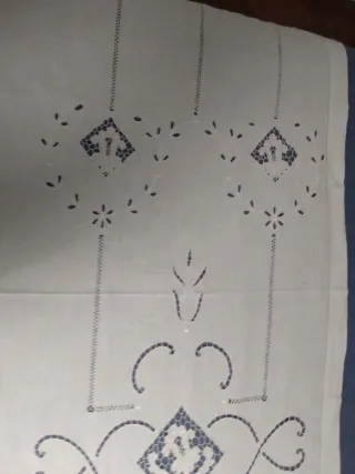 Tende in lino ricamo a mano