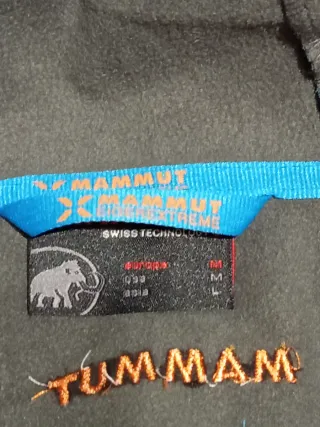 Chaqueta Mammut azul y naranja